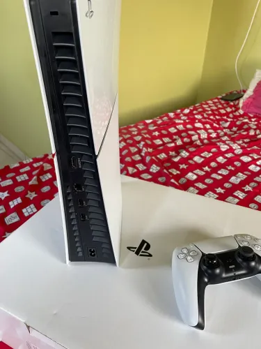 PS5 Slim semi novo( 8meses de uso) tudo zerado!!