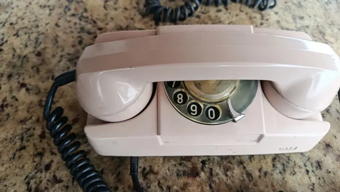 Telefone antigo rosa bebê