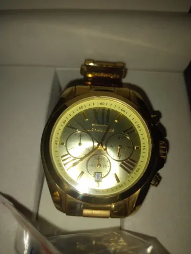 Relógio Michael kors Bradshaw MK5605 com acabamento dourado e numeros romanos