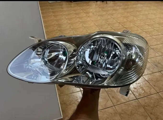 Farol original Corolla