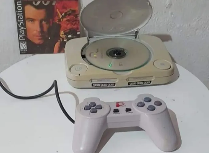 PS1 PSONE SLIM CONTROLE CABO E JOGO LASER FUNCIONANDO PERFEITAMENTE