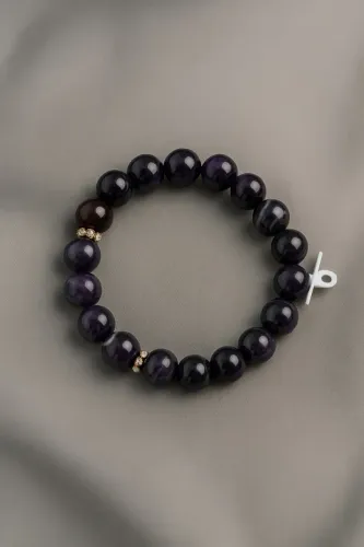 Pulseira de pedras naturais roxas e detalhe em dourado