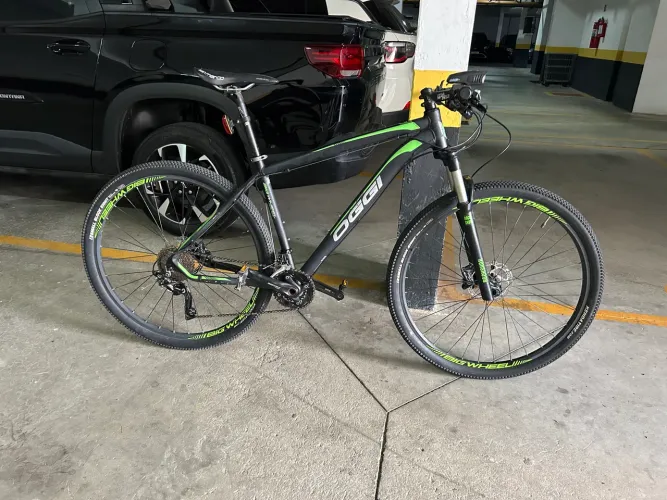 Bike Oggi Inteira Deore e Câmbio Traseiro Deore XT