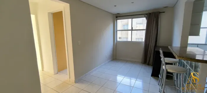 Apartamento de 2 dormitórios à venda no Residencial Argus, Coqueiros - Florianópolis.