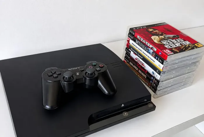 Console de PS3 com jogos