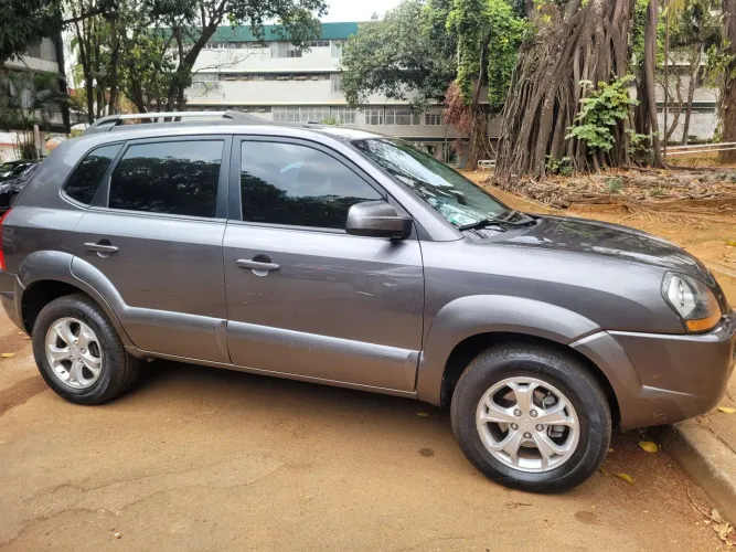 Tucson GLS 2.0 Flex automático,  muito novo 