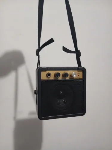 mini amplificador acompanha cabo