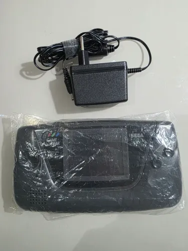 Game Gear Sega muito novo.