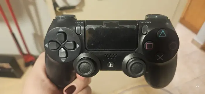 Garantia da OLX Controle Playstation Dualshock 4 Sony Cor Preto Ps4