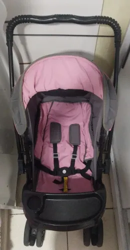 Bebê conforto e carrinho de menina