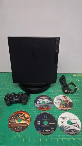 PS3 slim completo com jogos base vertical/ controle original