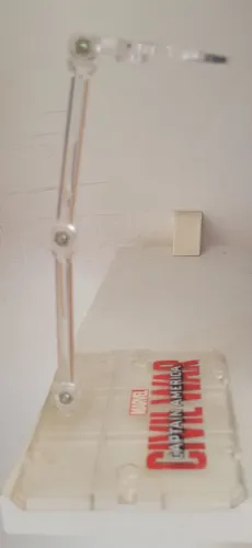 Suporte para bonecos