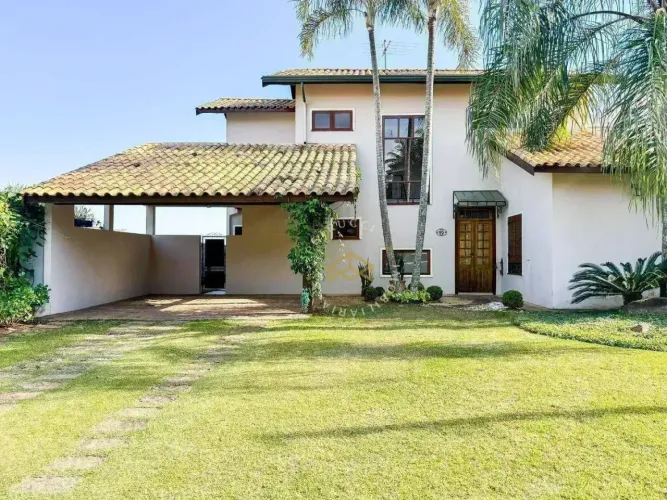 Casa com 3 dormitórios à venda, 317 m² por R$ 2.150.000,00 - Condomínio Bosques de Grevíle