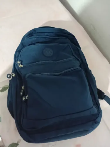 Vendo bolsa azul unisex com vários compartimentos para volta aulas, nunca usada.