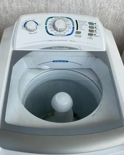 Vendo máquina 12 kilos usada