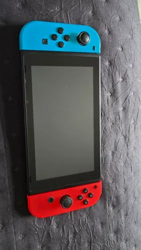 Nintendo Switch V2 + Pokémon Let's Go Eevee + Case + Controle Extra