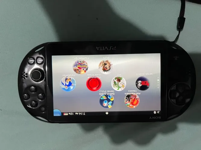 Psvita slim super conservado com case e 7 jogos