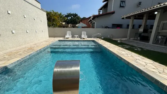 Casa para locação no Jardim Pernambuco II em Guarujá com 3 dormitórios sendo 1 suíte