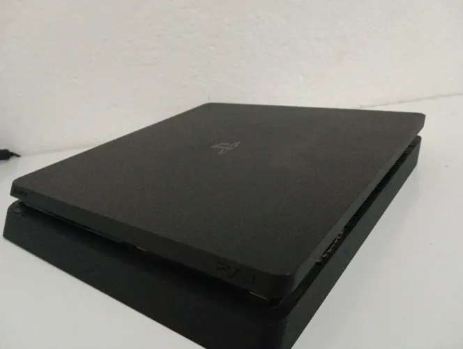 Ps4 com spider man,GTA,god of war com 17jogos 