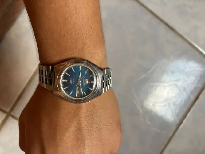 Orient 3 estrelas com mostrador azul bebê com azul marinho