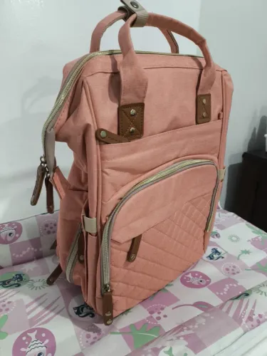 Vende-se Lote De fraldas, Banheira e trocador, e carinho 2 em 1.