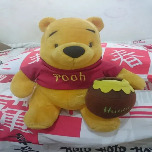 ursinho pooh com pote de mel iten de colecionador 