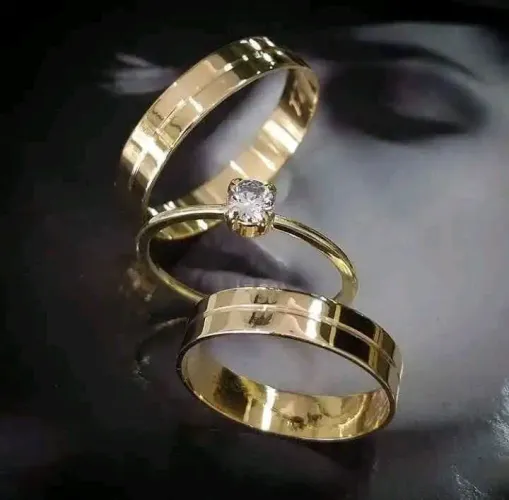 Par de alianças de ouro 18k com brilhante