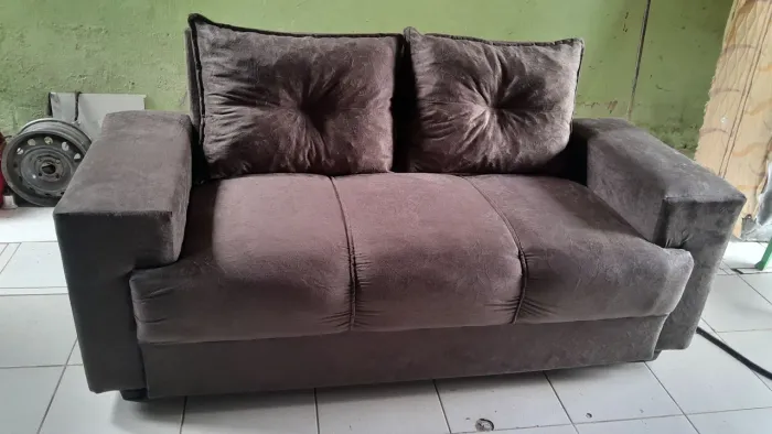 Promoção na compra desse sofá você ganha um puff 