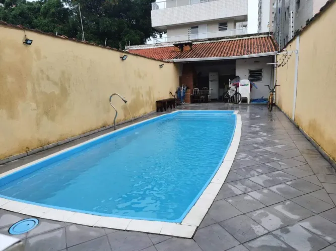 Casa com 4 suítes à venda, 220 m² por R$ 1.500.000 - Vila Guilhermina - Praia Grande/SP