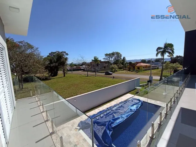 Casa com 4 dormitórios à venda, 244 m² por R$ 1.490.000,00 - Condomínio Ninho Verde II - P