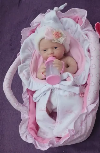 Boneca Reborn Toda  de Silicone Sólido 33 cm.