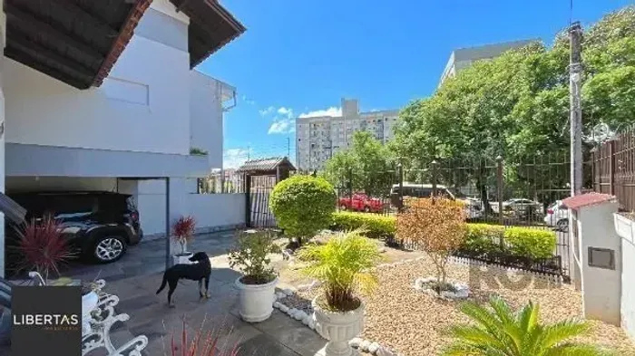 Casa 4 dormitórios à venda, piscina, bairro Camaquã-Poa.