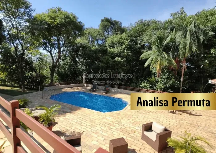 Chácara dos sonhos à venda com piscina aquecida, casa climatizada, casa de caseiro/visita,