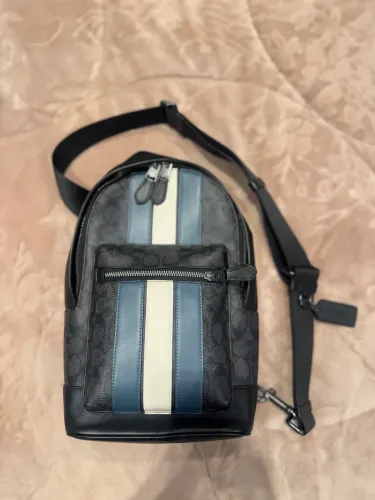 Mochila Coach (modelo charter pack signature denim)