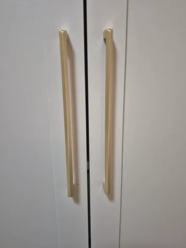 Puchador para guarda-roupa