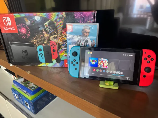 VENDO OU TROCO NINTENDO SWITCH D2 ACOMPANHA JOGO CAIXA E CABOS