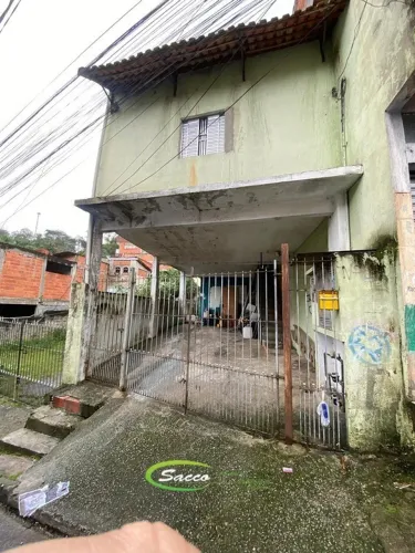 Terreno com 3 casas para renda em Barueri