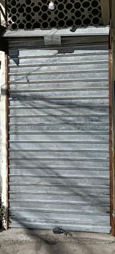 Vendo essa porta de loja de aço