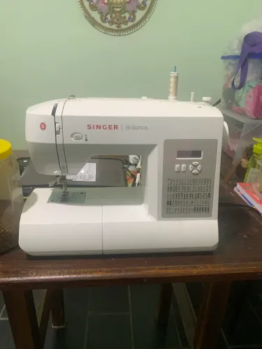 Máquina de costura singer