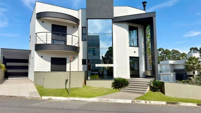 Casa com 4 dormitórios à venda, 336 m² por R$ 3.495.000,00 - Residencial Real Park - Arujá