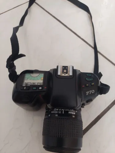 camera nikon ,f 70 -35mm- 80 mm ,1.4-5.6d ,longa distancia,precisa limpar a lente interna