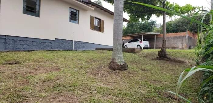Terreno com casa simples no coração do Rio Tavares