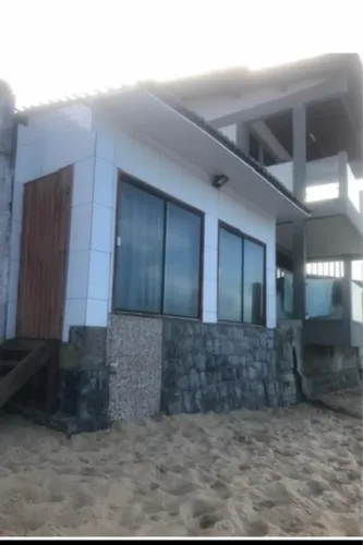 Cada pé na areia Baia Formosa.