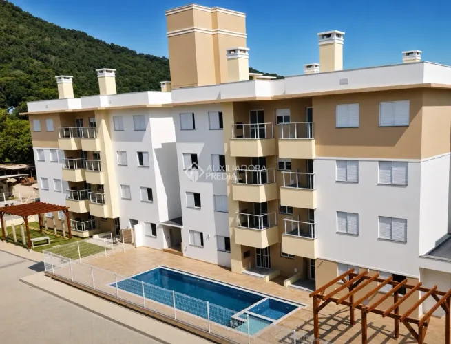 Apartamento mobiliado de 2 dormitórios com sacada e churrasqueira em Vargem Grande