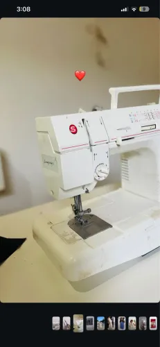 Máquina de costura singer