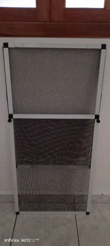 tela mosquiteira de encaixe regulàvel para vaos de janelas