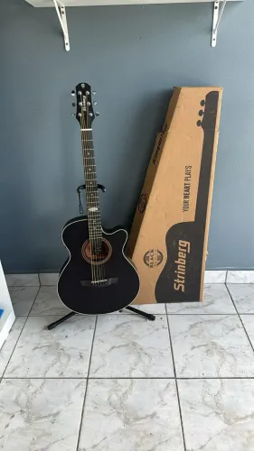 Violão elétrico novo na caixa com suporte
