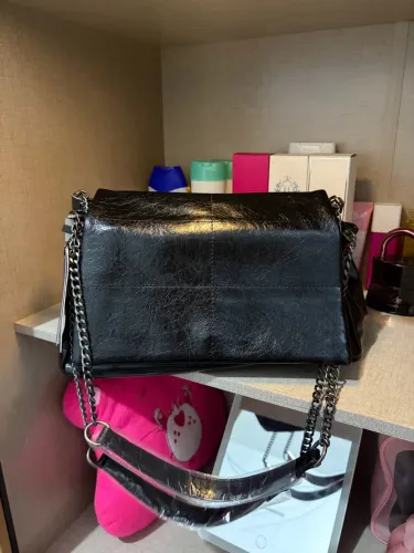 Bolsa nova muito linda 100,00. Nunca usada.