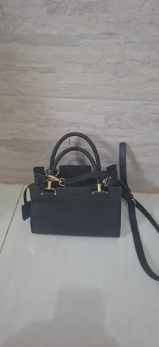 Bolsa Sapatinho de Luxo, preta tamanho média. Bem conservada.