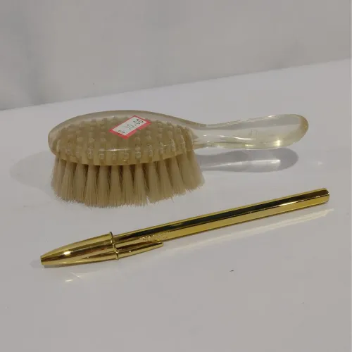 Escova antiga para roupas